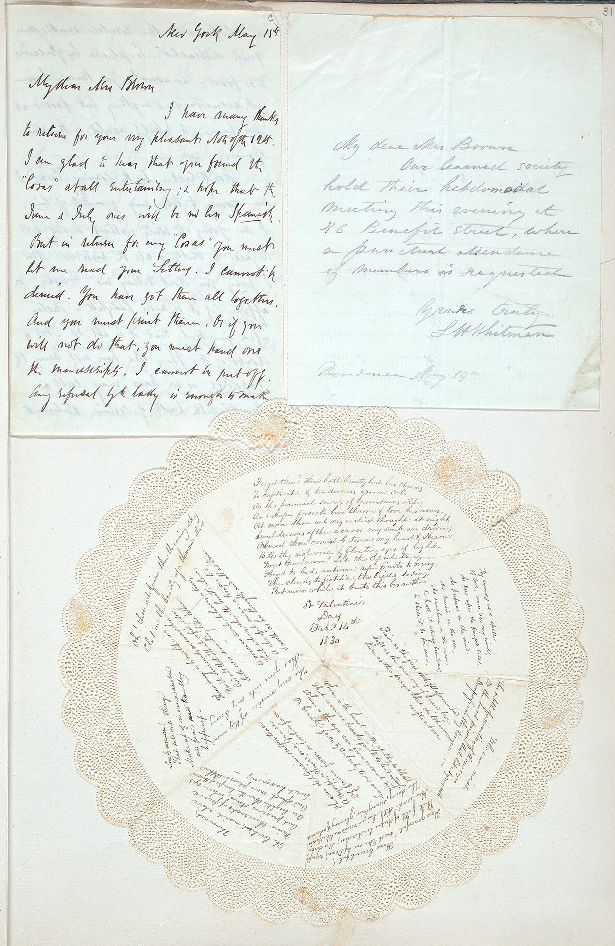 Scrapbook page with paper lace doily and letters