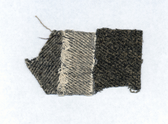 A sample of fabric with various woven patterns