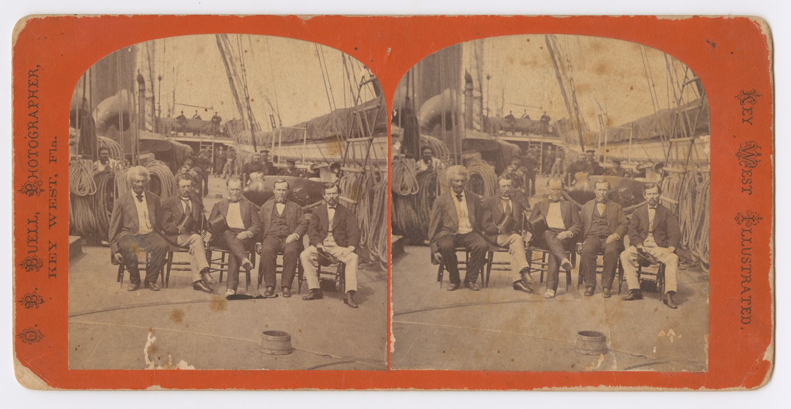 Two side-by-side portraits of five men in suits seated in front of a shipping harbor