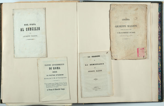 Four pamphlets mounted on two scrapbook pages